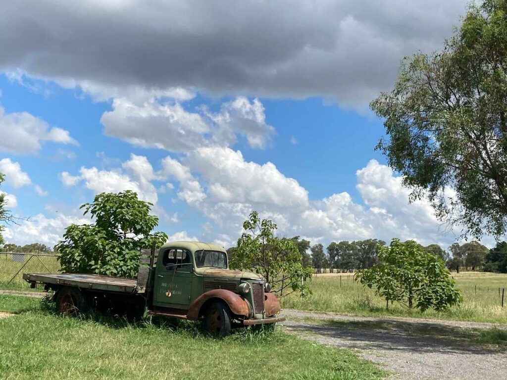 Rust vehicle and picturesque views at the Vintner's Daughter Winery on a Canberra wineries tour